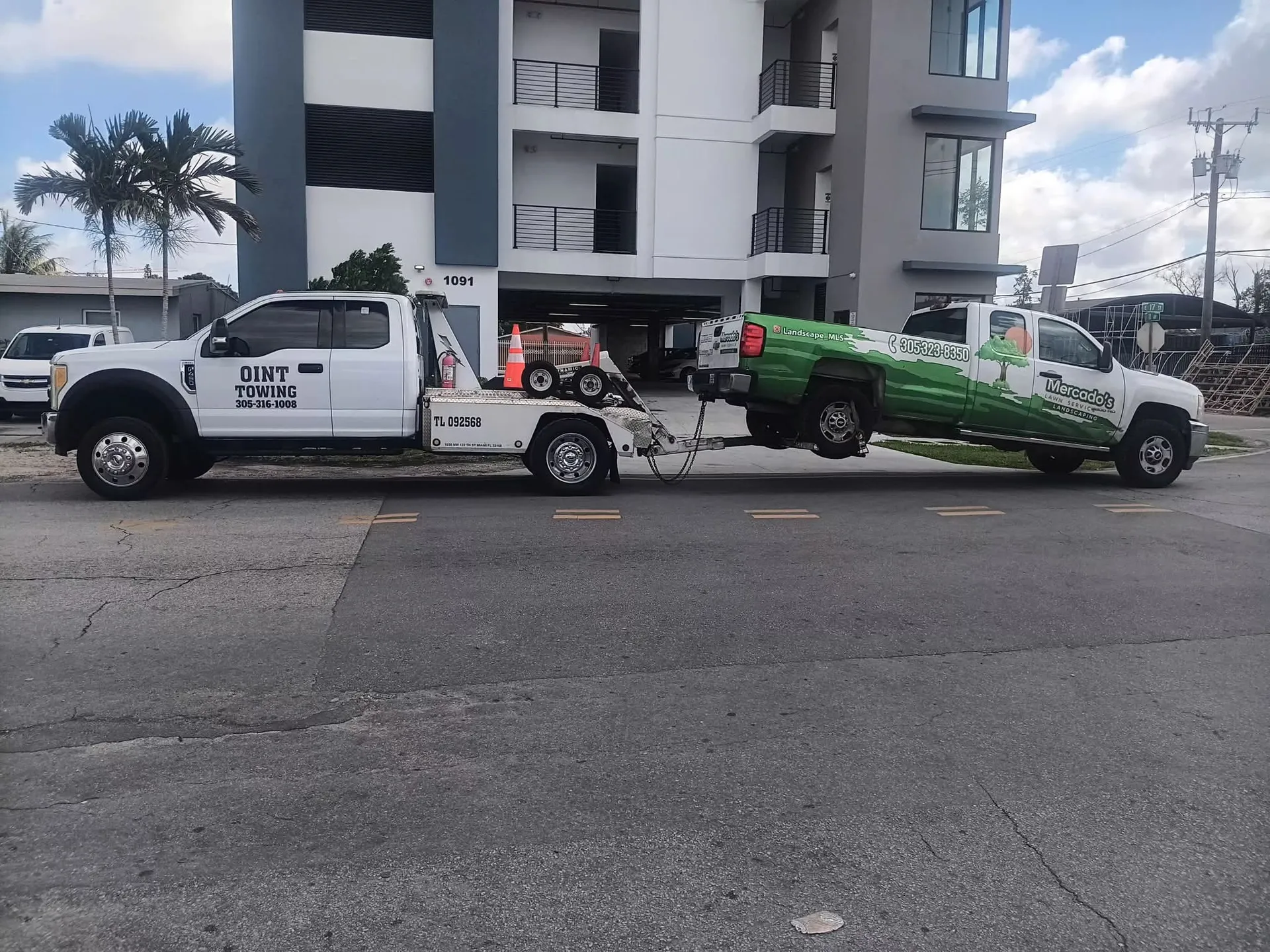 Oint Towing INC truck on a job